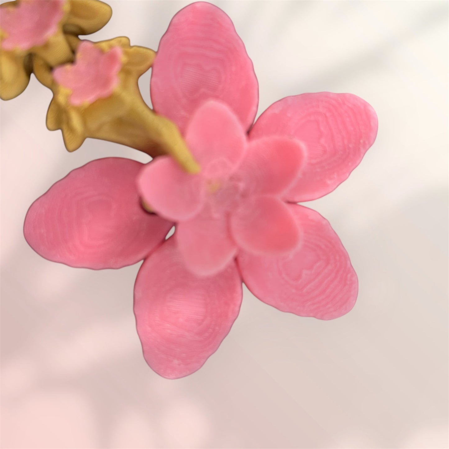 1 Layer At A time Baby Cherry Blossom Dragon figurine with pink pearlescent scales and sakura-inspired wings.