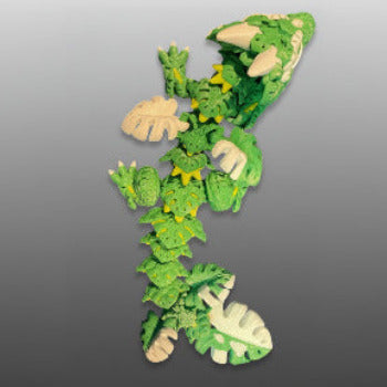 1 Layer At A time Baby Monstera Plant Dragon, a green and white articulated dragon with monstera leaf details and yellow accents.