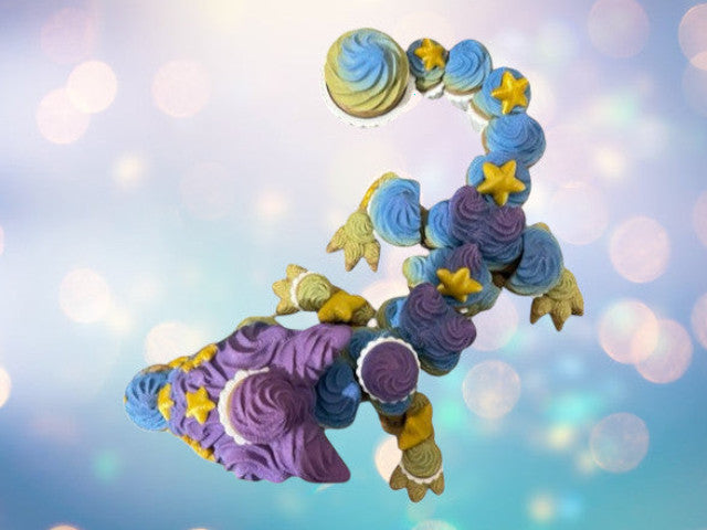 1 Layer At A time Birthday Cupcake Dragon with clicker tail, purple, blue, yellow, and green frosting details, articulated body, 11.5 inches.