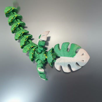 1 Layer At A time Monstera Dragon articulated toy, green and white PLA, leaf-shaped body, 19 inches long.