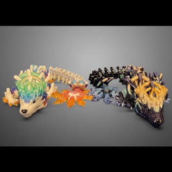 Two colorful toy dragon on a light blue background
