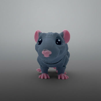 Toy mouse figurine in a garden with flowers and water
